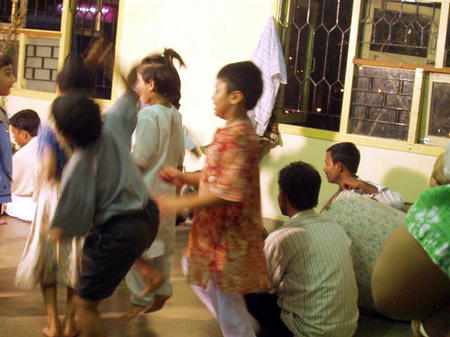 kids dancing in front of the idols