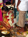 Bride washing her parents feet